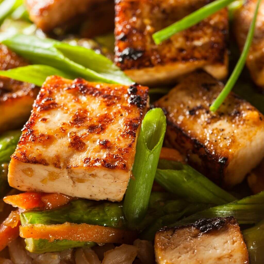 Honey-Glazed Stir-Fry Tofu with Vegetables, a colorful stir-fry dish featuring tofu, vibrant vegetables, and a honey glaze.