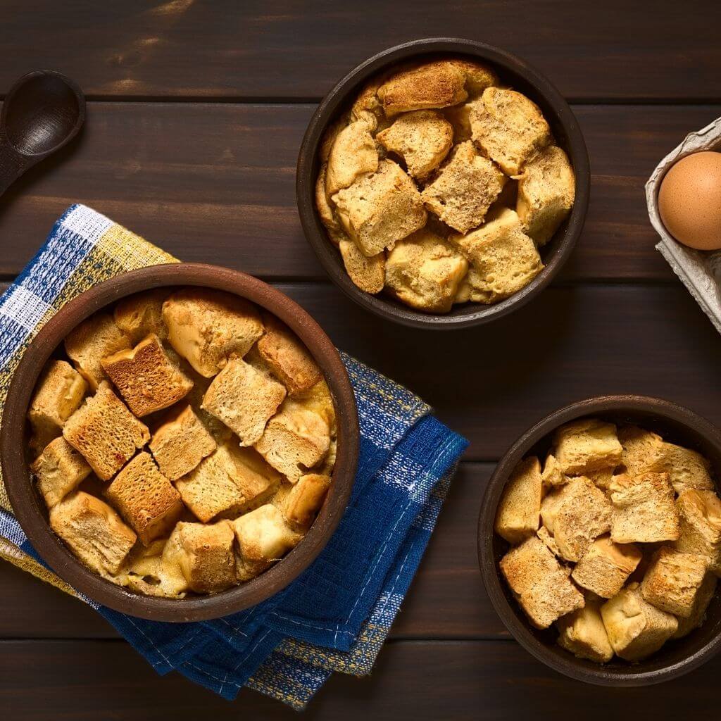 Honey-Spiced Bread Pudding, a warm and comforting dessert with a honey-infused spiced sauce.