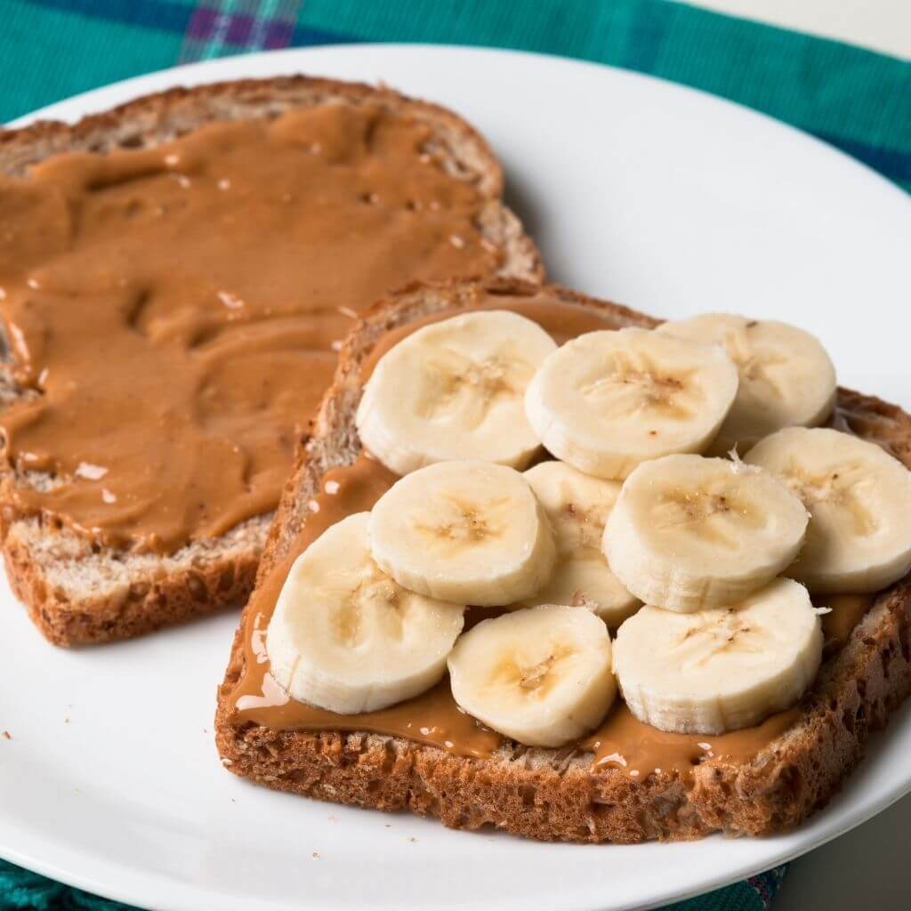 Honey and Banana Peanut Butter Sandwich, a delightful combination of creamy peanut butter, sliced bananas, and honey, between two slices of bread.