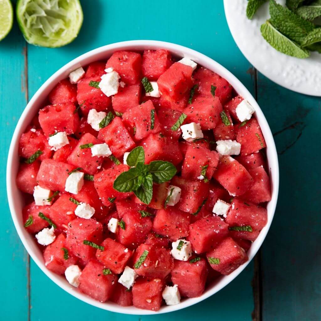 Honey and Feta Watermelon Salad, a refreshing salad featuring watermelon cubes, crumbled feta cheese, and a drizzle of honey.